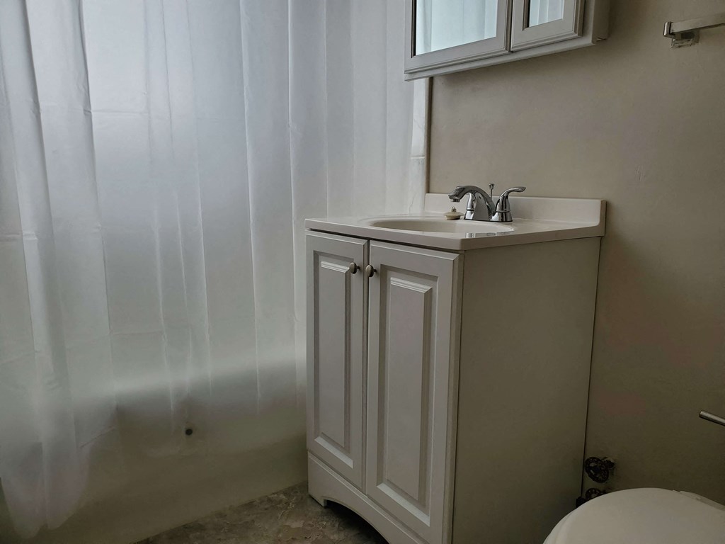 a small bathroom with a sink and a toilet