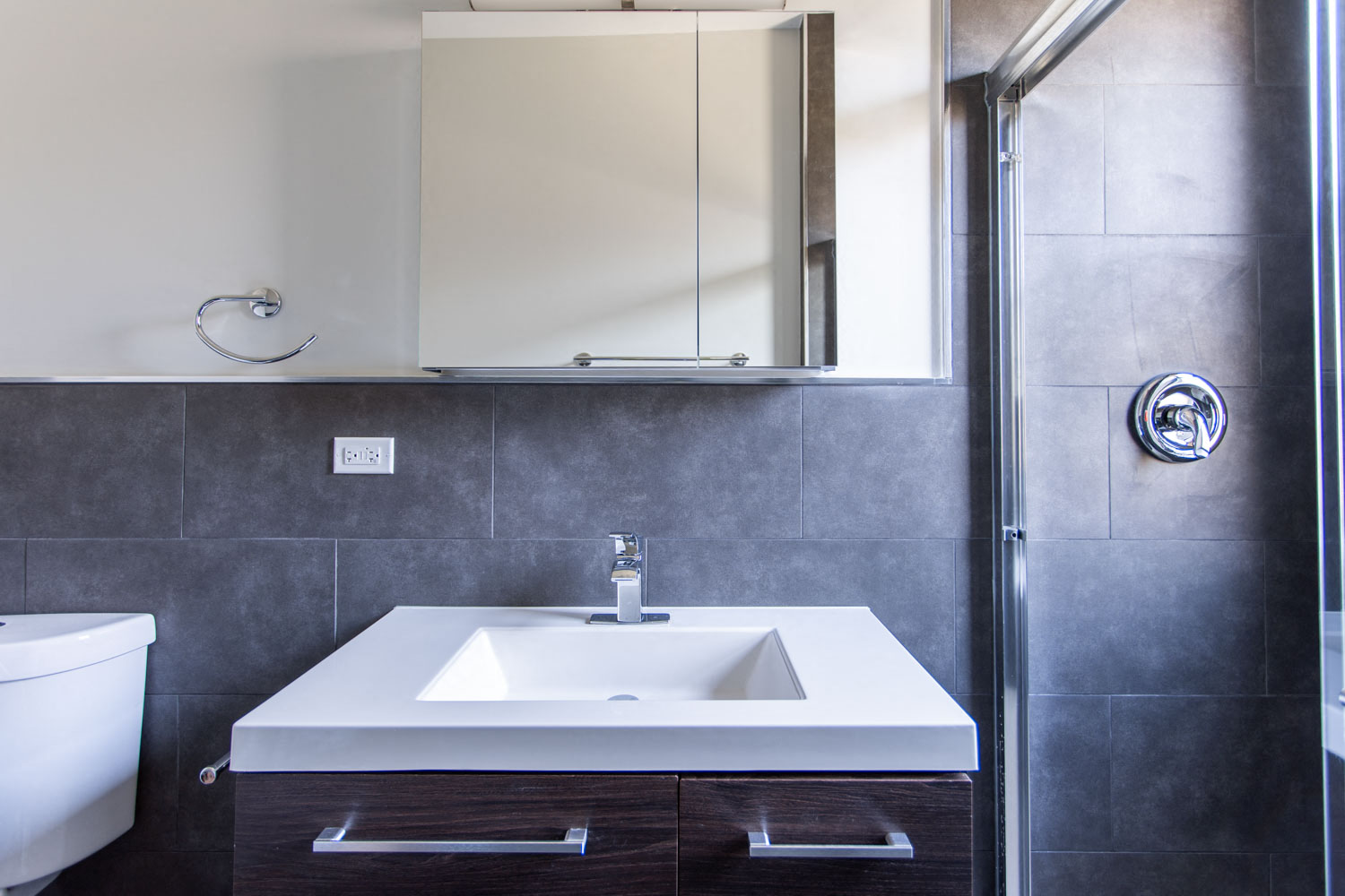 a bathroom with a sink and a shower