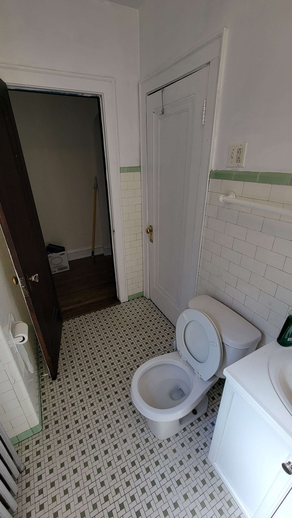 a small bathroom with a toilet and a sink
