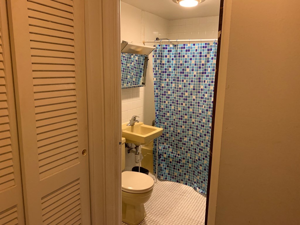 a small bathroom with a sink and a toilet