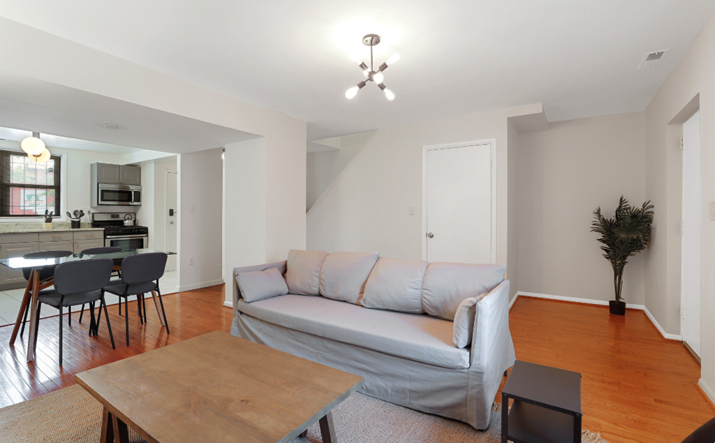 a living room with a couch and a table