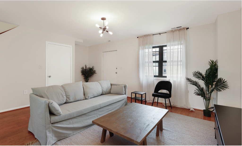 a living room with a couch and a coffee table