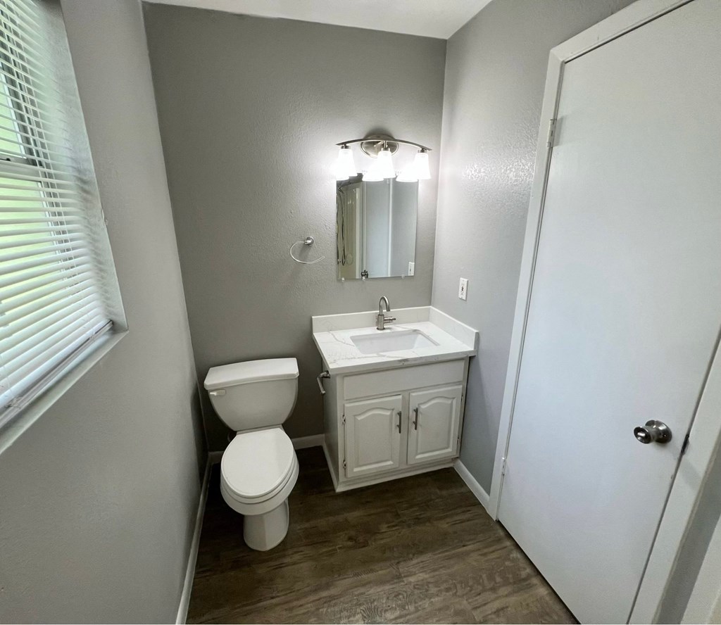 a small bathroom with a toilet and a sink