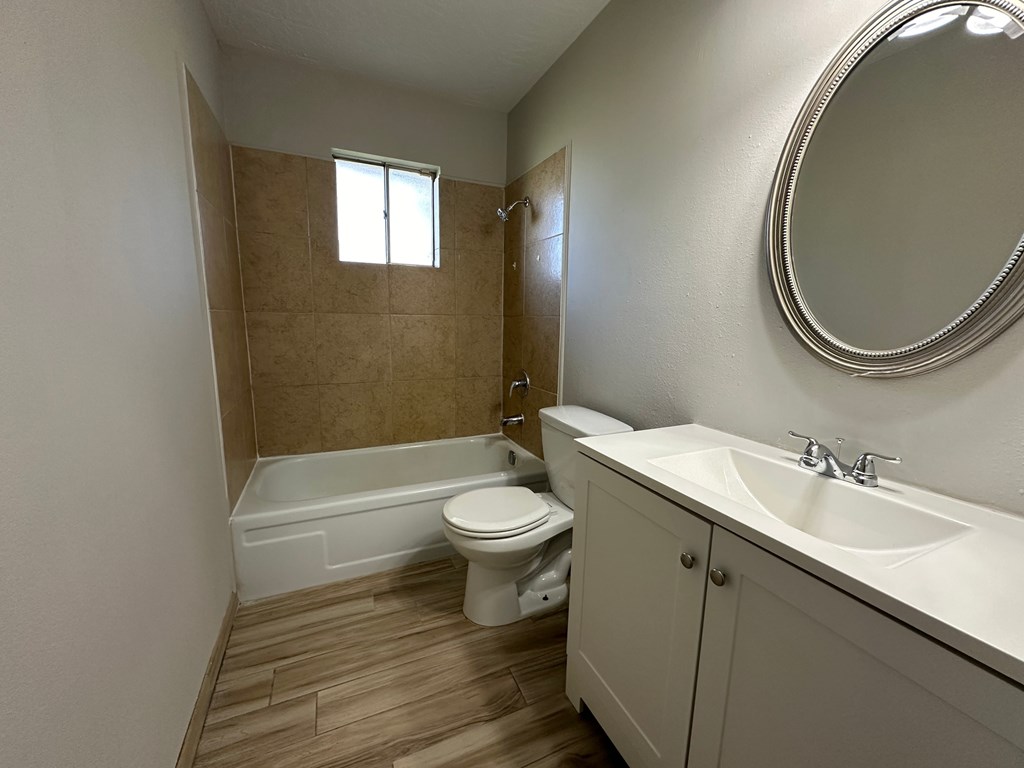 an image of a bathroom with a toilet and a sink
