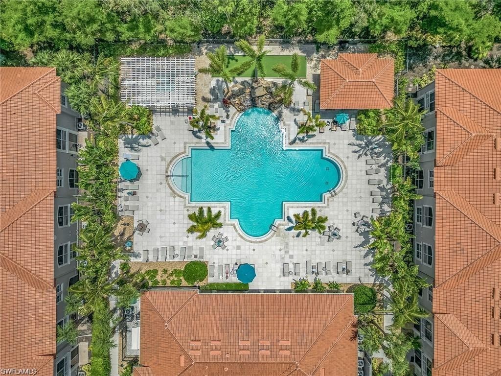 a pool that looks like a big star in the center of the resort