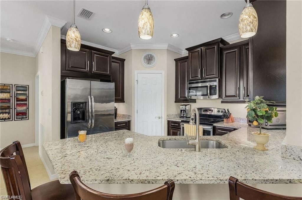a kitchen with a counter top and a sink