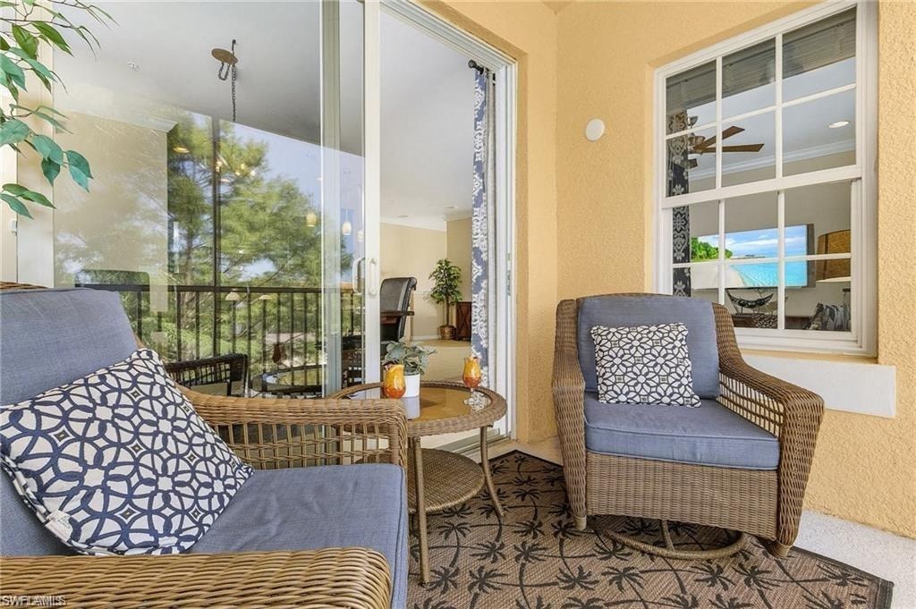 a living room with two chairs and a table