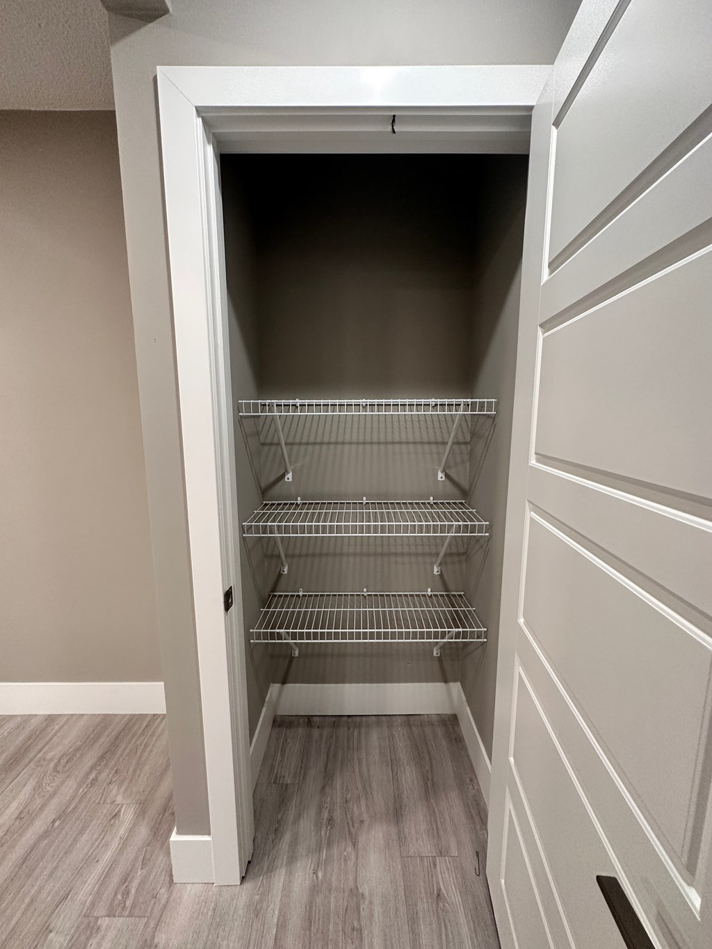 the closet in a studio apartment at the flats at big tex apartments