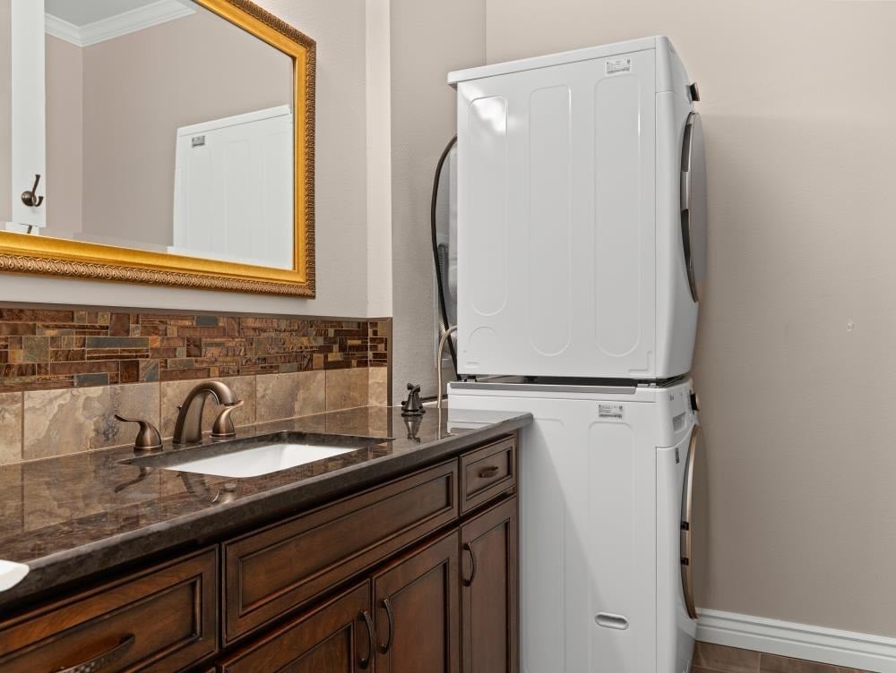 a kitchen with a sink and a refrigerator
