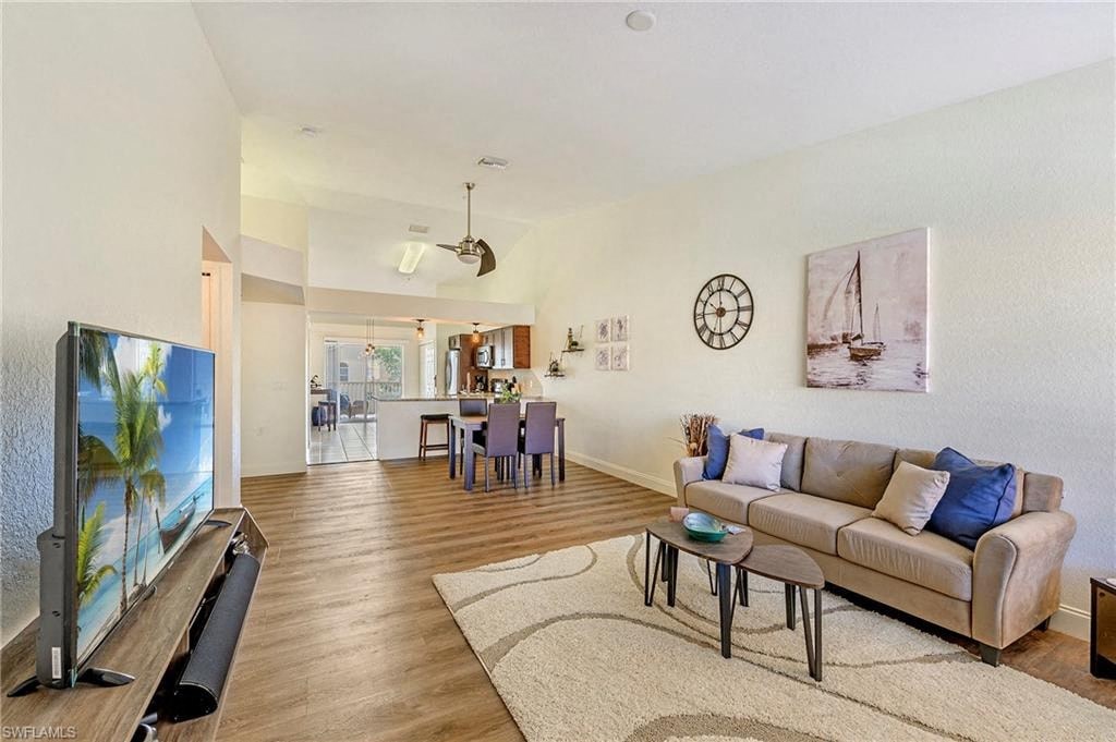 a living room with a couch and a television