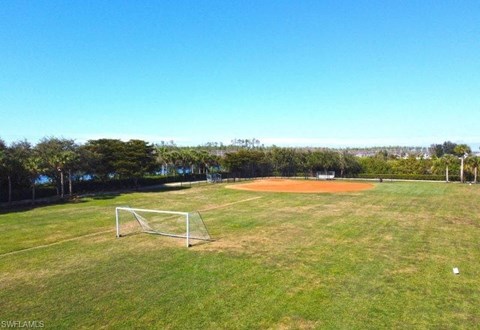 a soccer field with a net on it