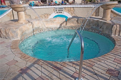 a hot tub with water coming out of it
