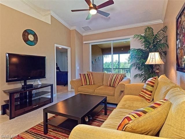a living room with a couch and a television