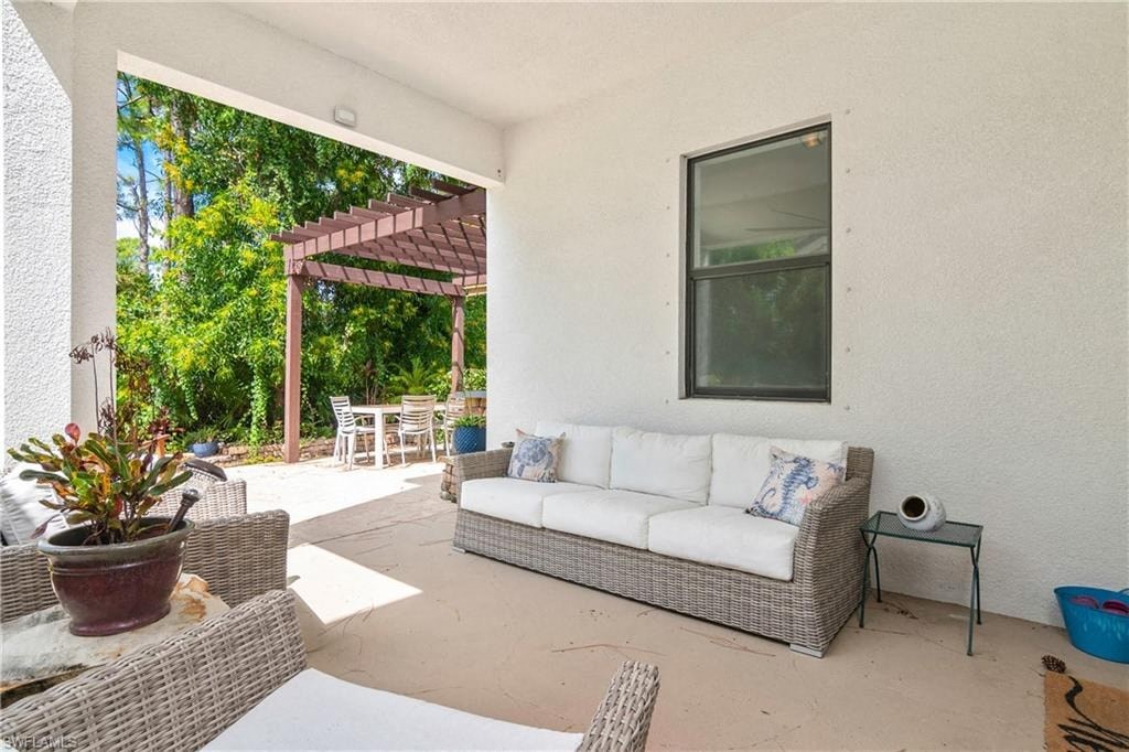 a living room with a couch and a patio