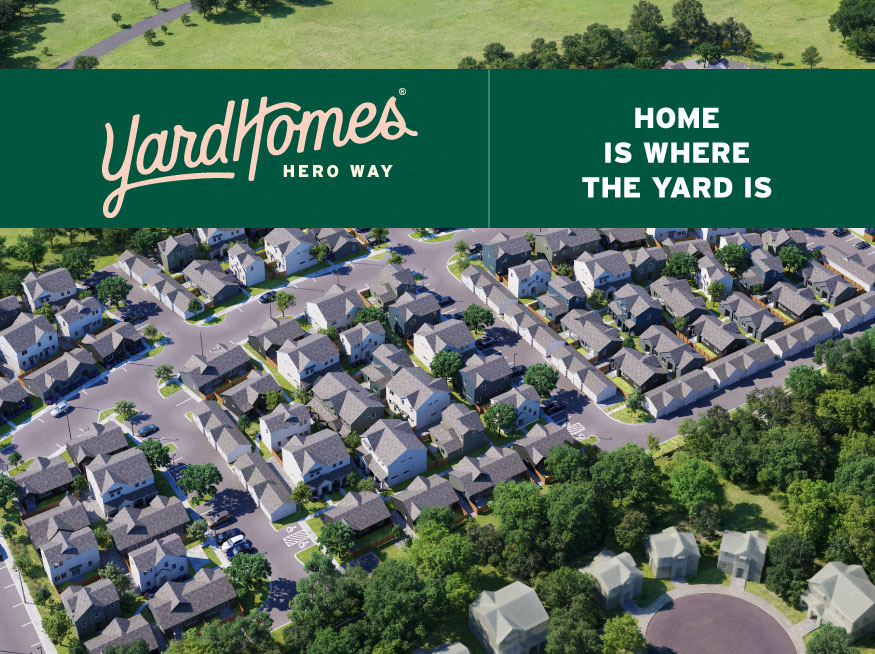 a suburban neighbourhood with a sign that reads yard homes where the yard is