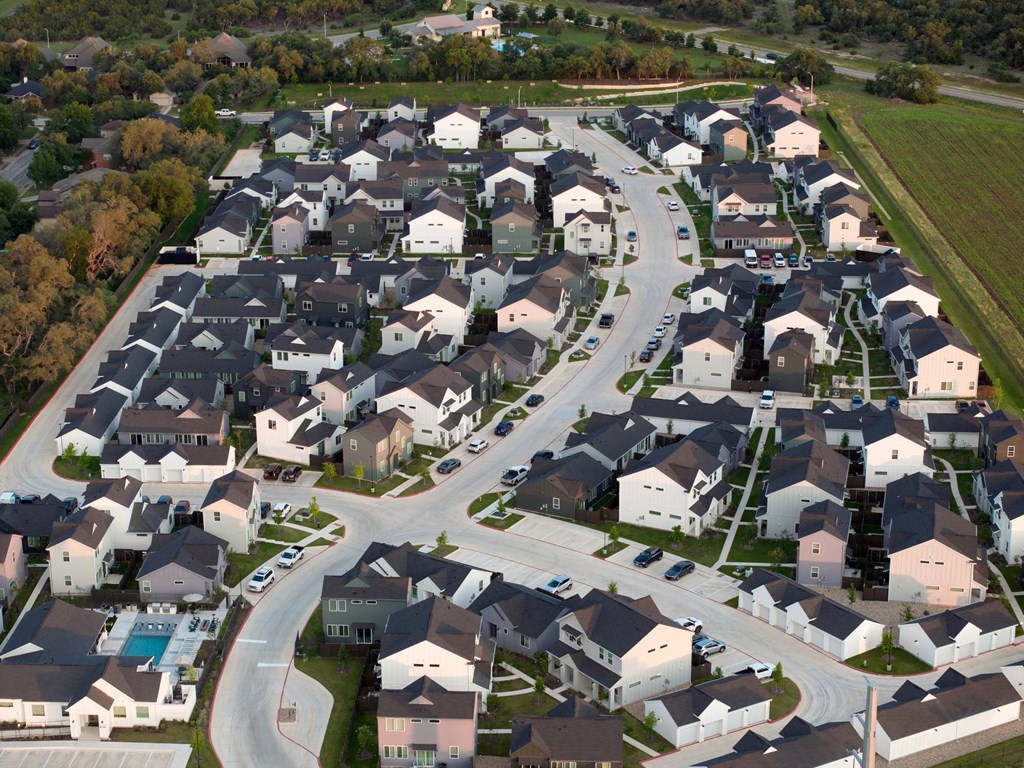 A suburban neighborhood with houses and streets.