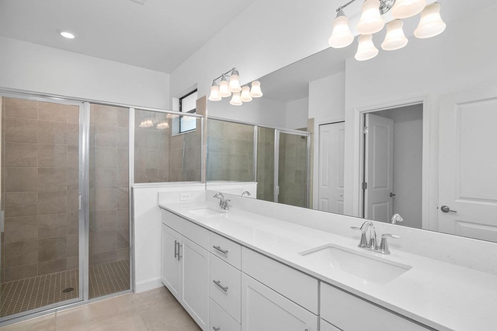 a bathroom with a sink and a shower