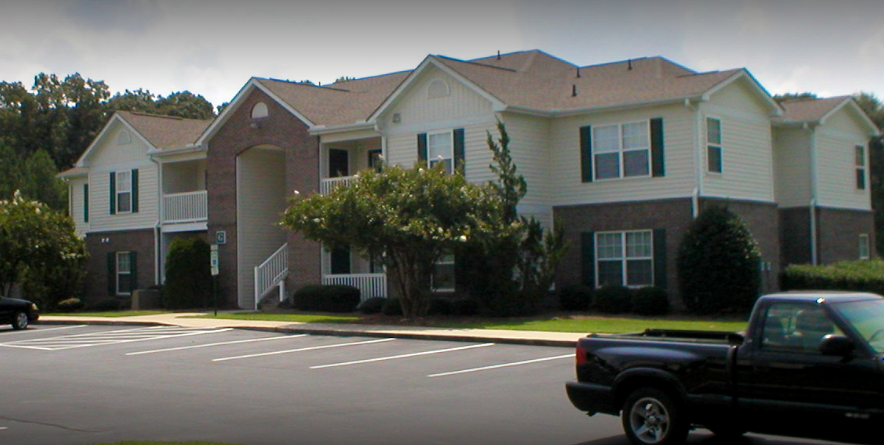a building with a truck parked in front of it