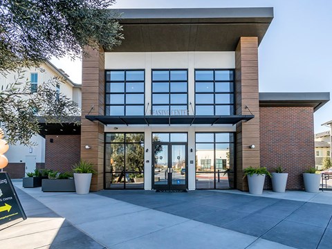 The front of a building with a sign that says