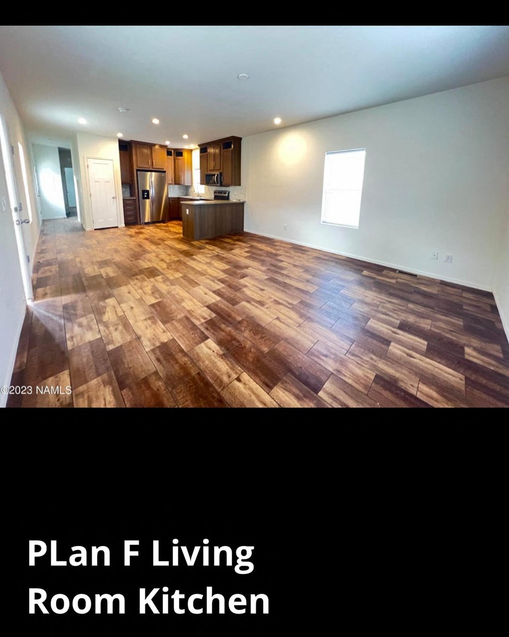a plan f living room kitchen with wood flooring