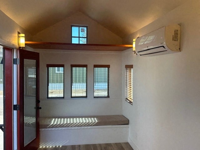 a white room with a window and a air conditioner