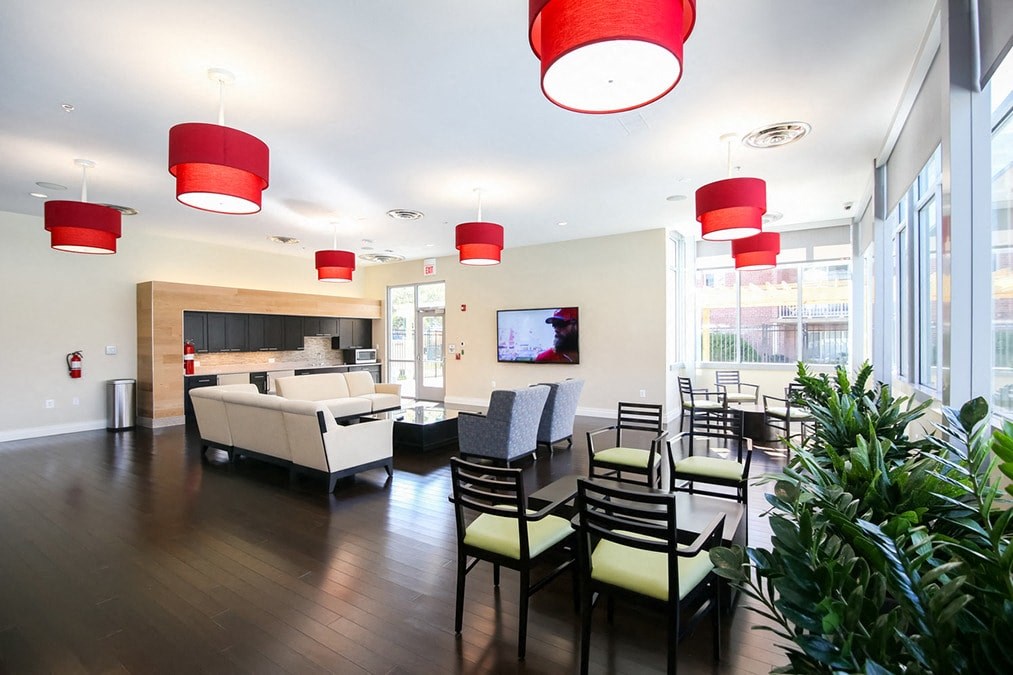 a dining room with a table and chairs and a living room