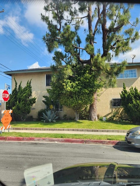 a house with a stop sign in front of it