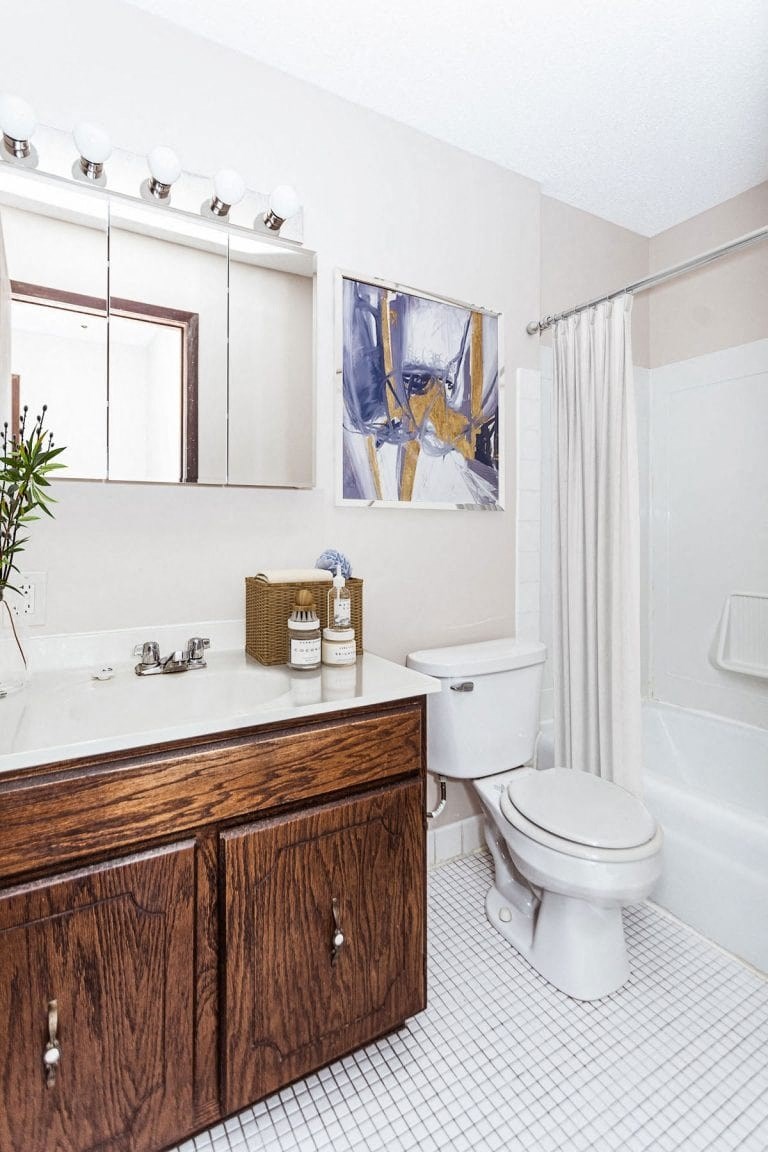 a bathroom with a toilet and a sink