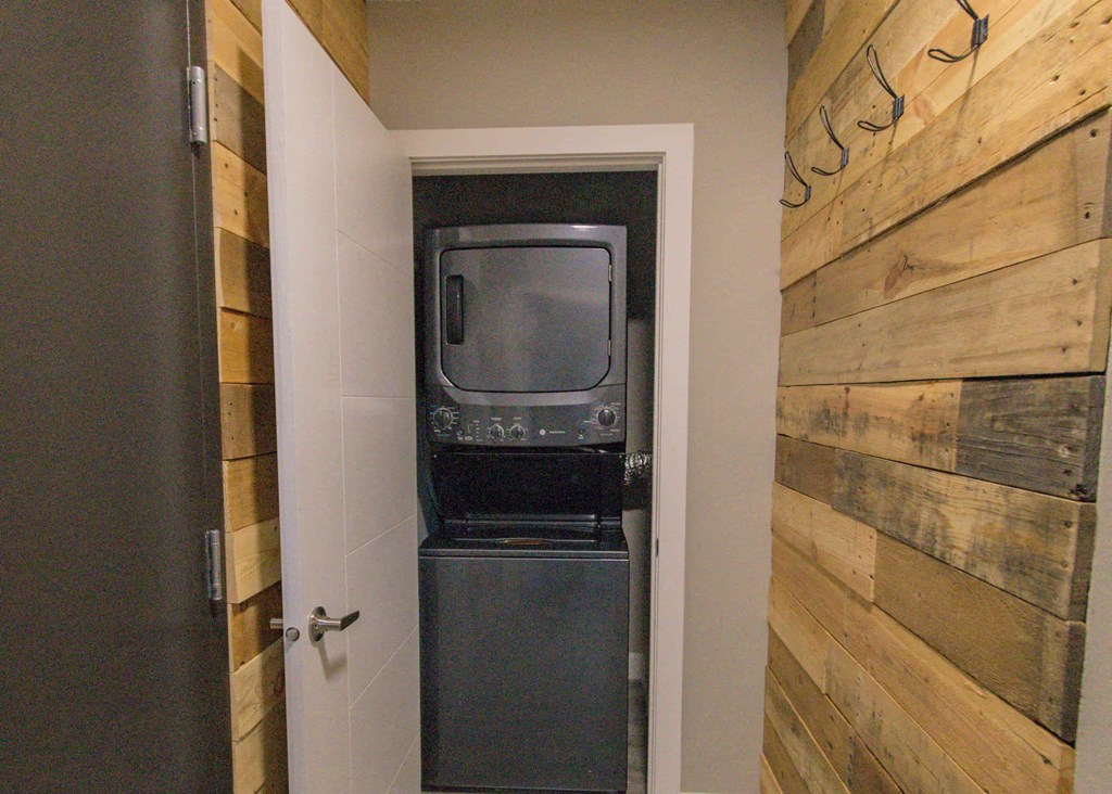 a small room with a television in a closet