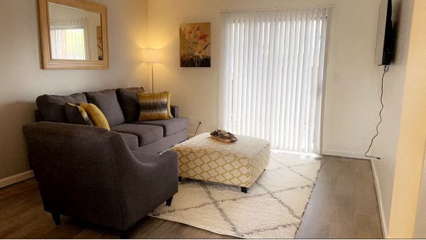 a living room with a couch and an