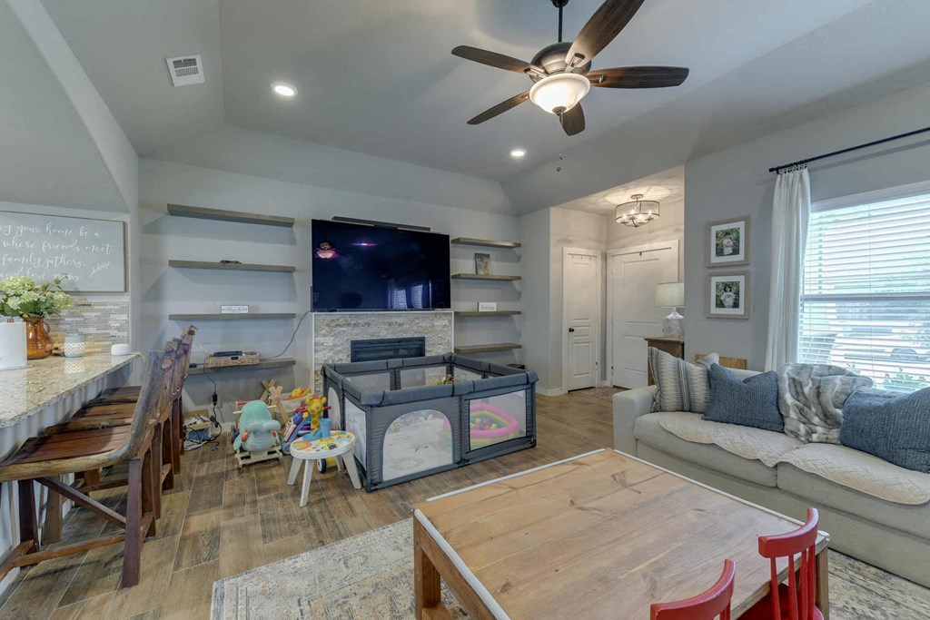 a living room with a couch and a table