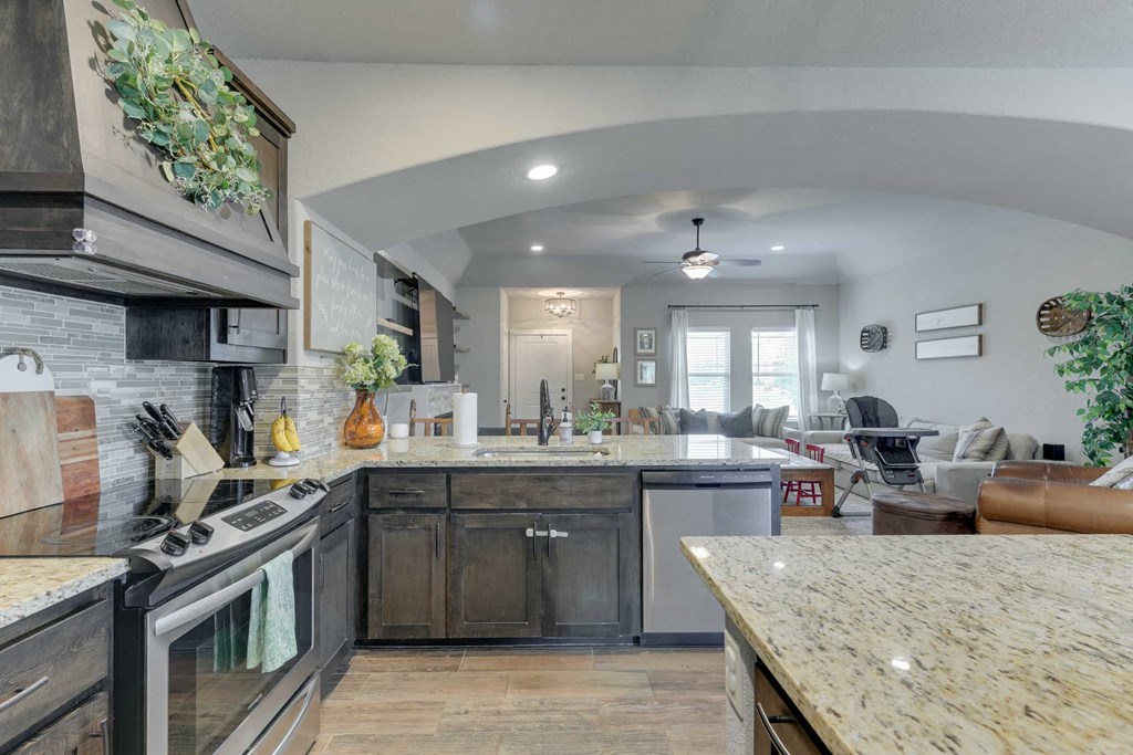 a kitchen with a sink and a counter top