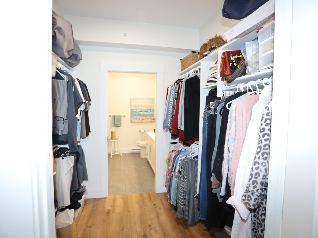 Closet with clothes hanging