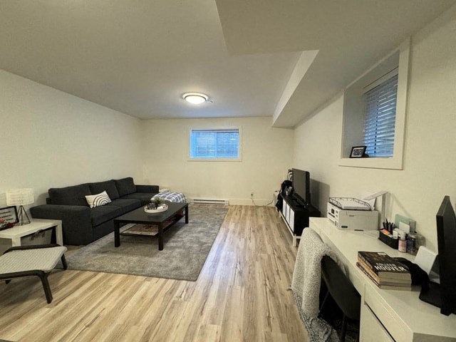 a living room with a couch and a tv