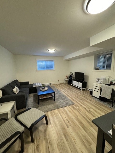 a living room with a couch and a table