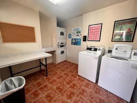 A laundry room with a washer and dryer.