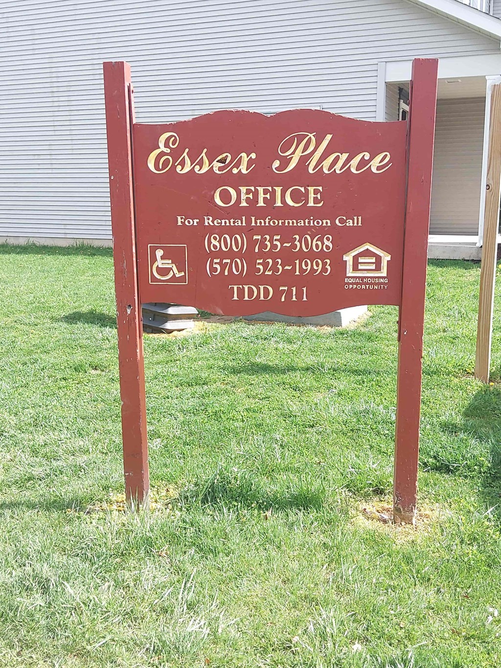 a sign in the grass