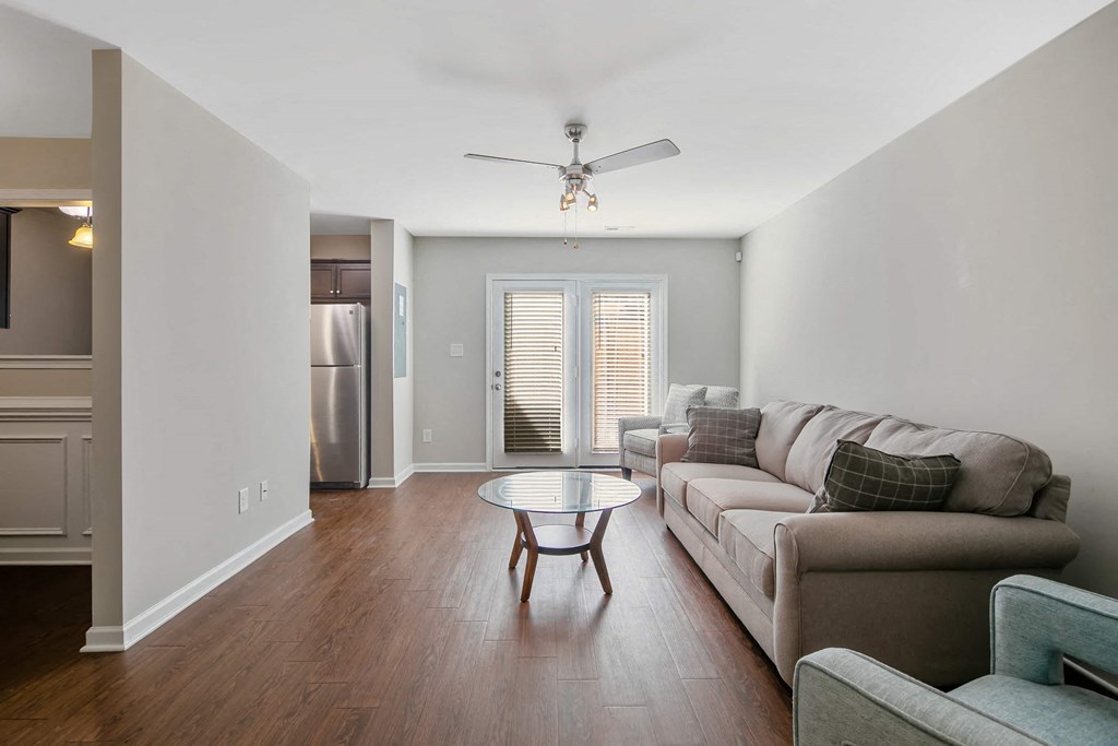 a living room with a couch and a table