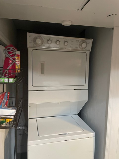 A white dishwasher is installed in a kitchen.