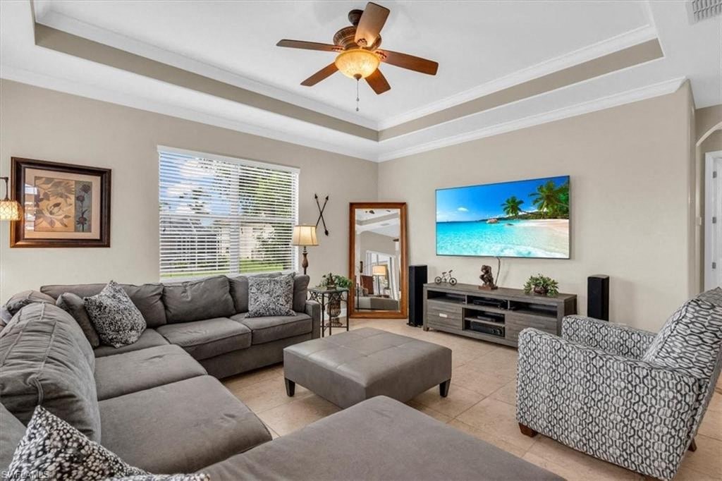 a living room with a couch and a tv