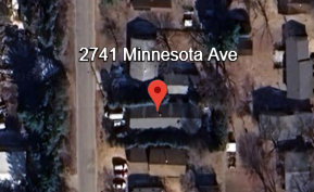A street view of Minnesota Ave with a red pin on a house.