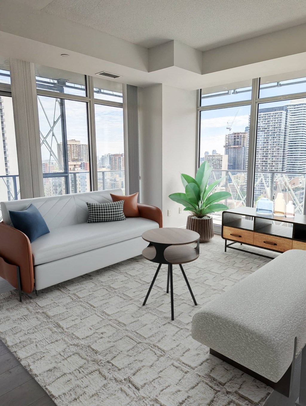 a living room with a white couch and a table