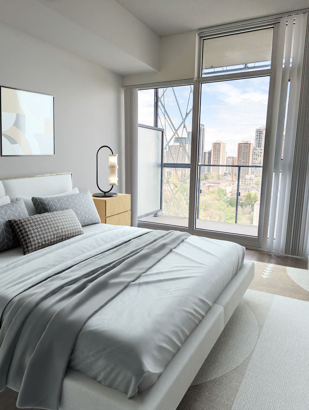 a bedroom with a bed and a large window