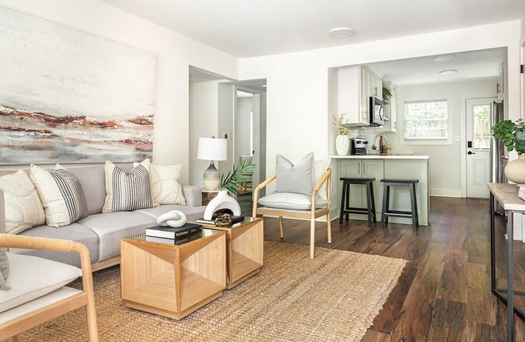 a living room with a couch and a table