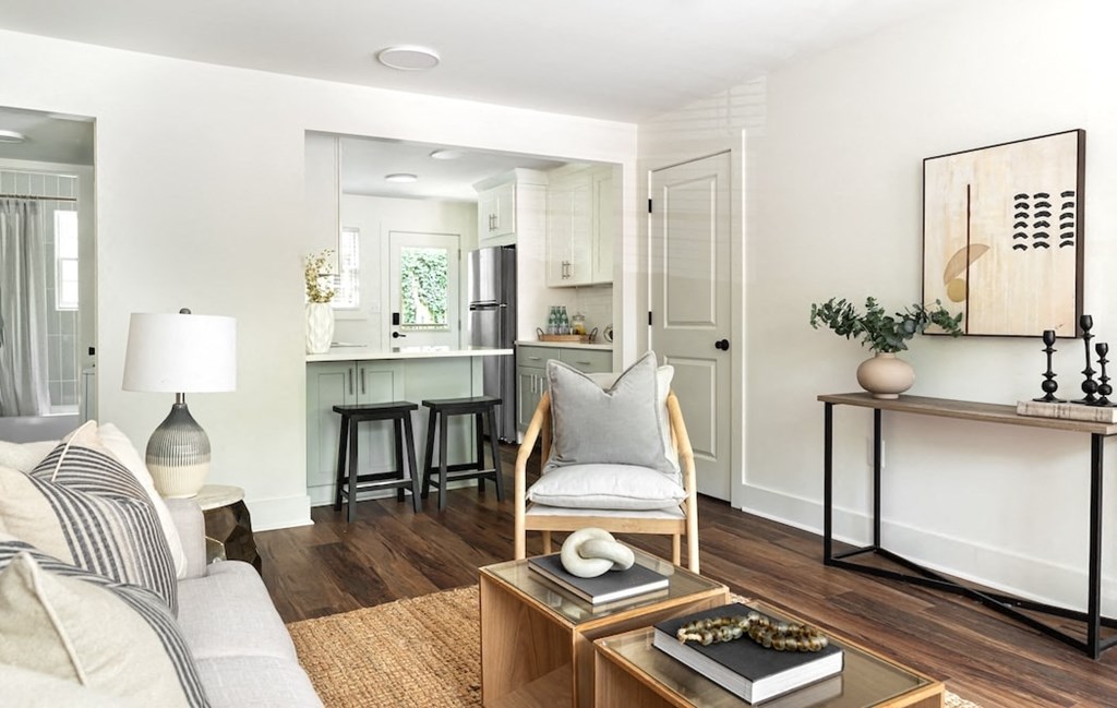 a living room with a couch and a table