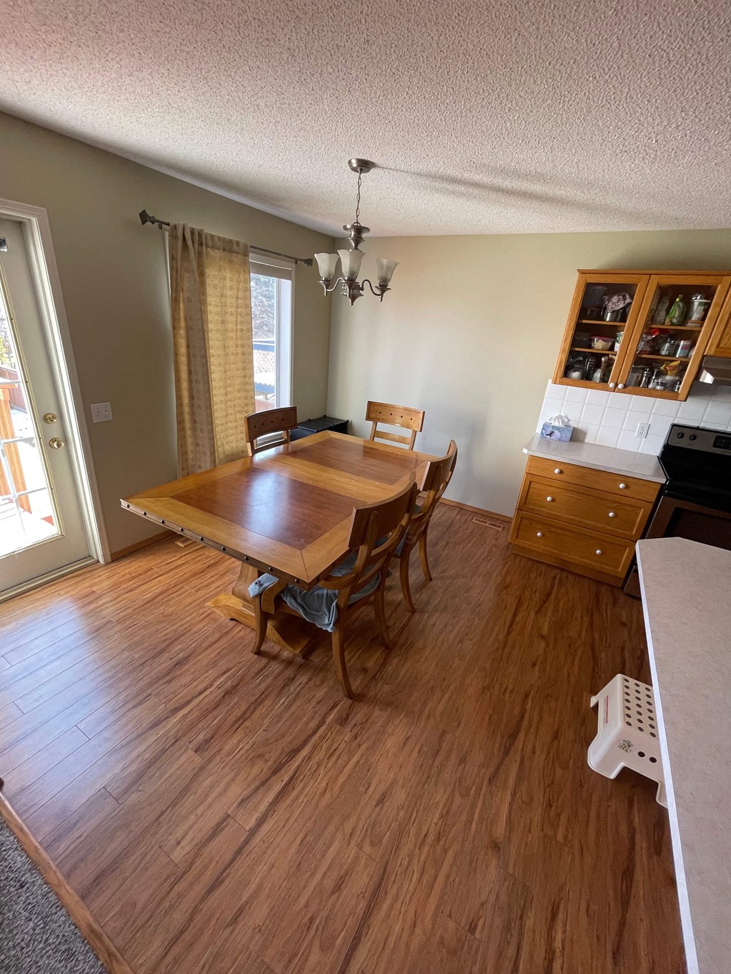 another view of the dining room and kitchen