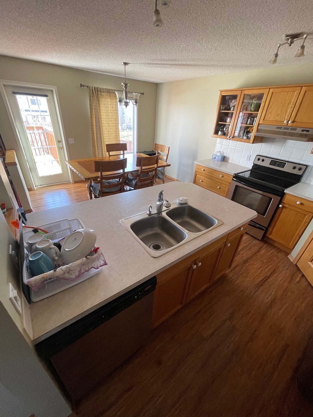 an aerial view of a kitchen and a dining room