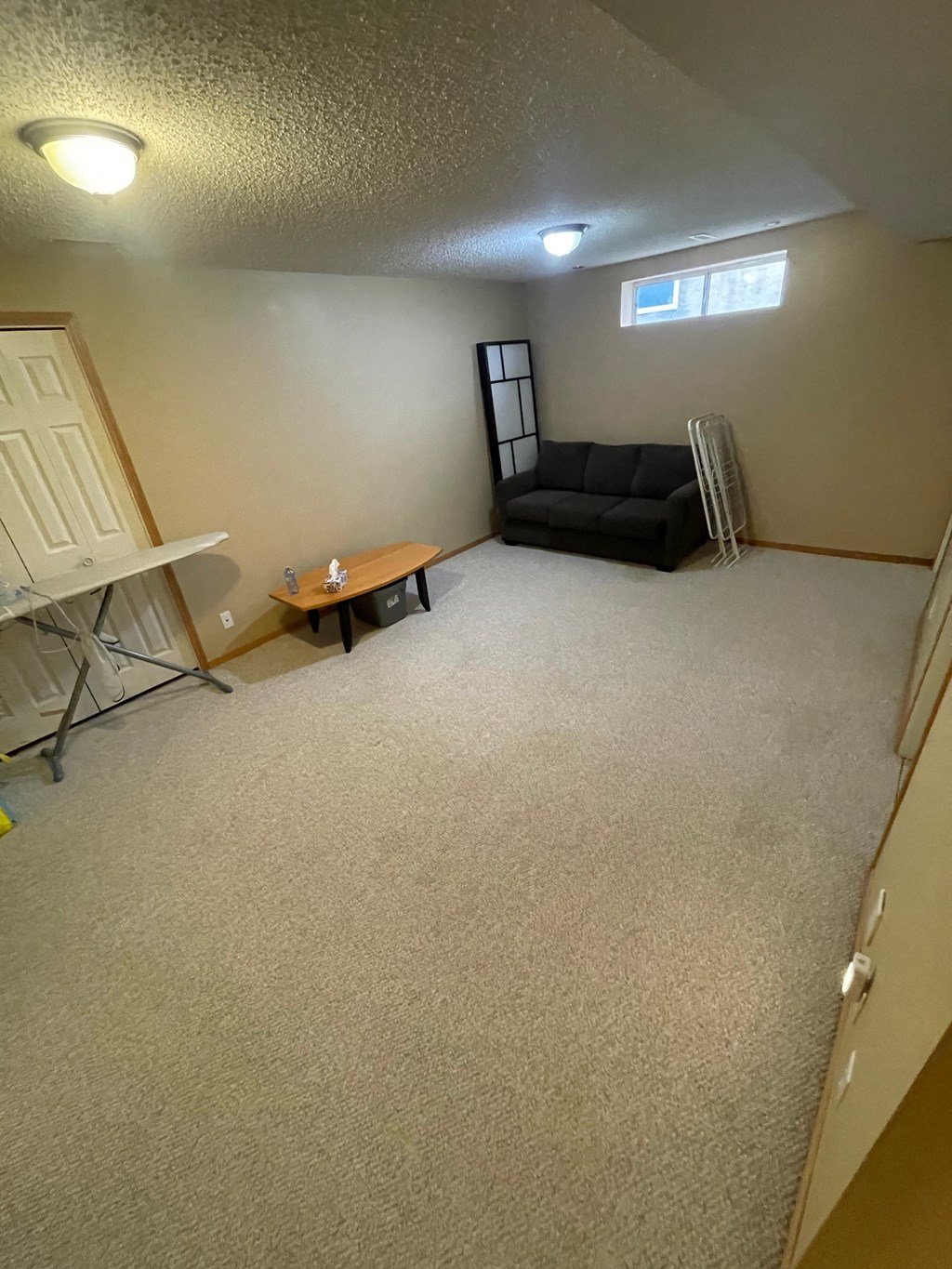 a living room with a couch and a table