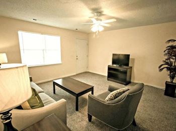 spacious living room with model furnishings