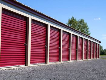 storage units with red roll doors